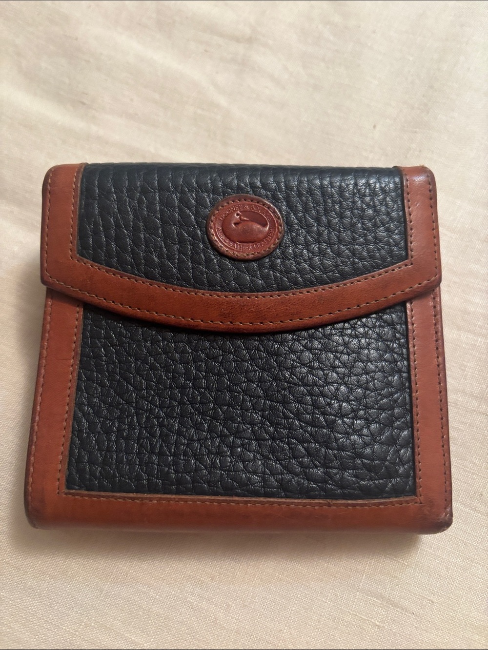 Dooney & Bourke Black Leather Wallet with Brown Trim